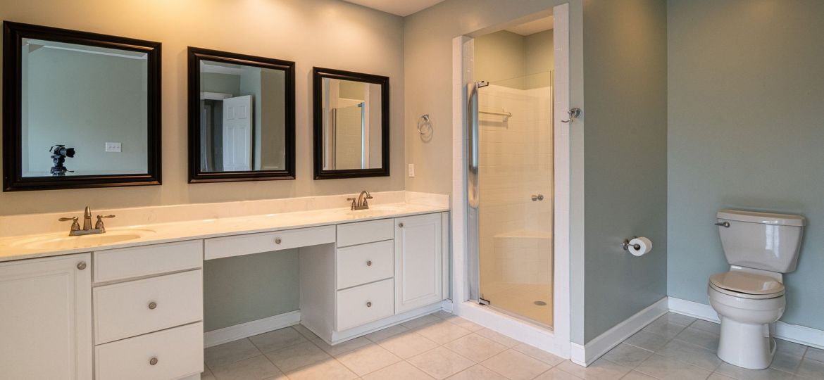 modern bathroom renovation,large format tiles,contemporary bathroom lighting